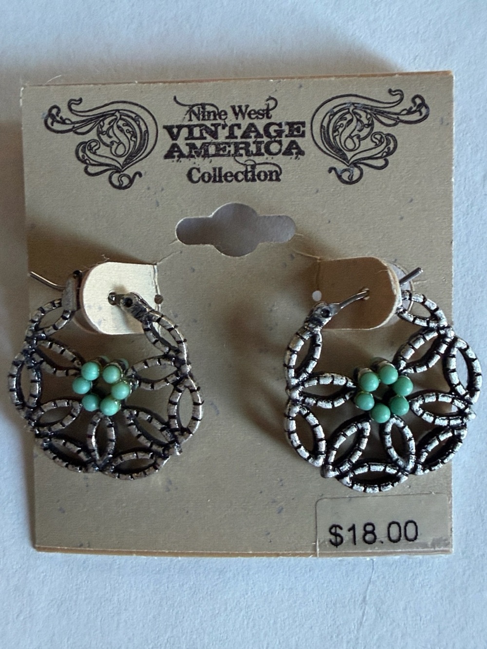 Nine West silver-tone filigree hoop earrings with turquoise accents